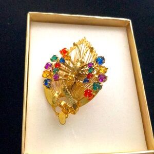 Gold tone gem stone brooch